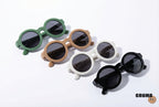 Snap Biscuits kids sunglasses, available in Brown, Kiwi Slice, Black and White