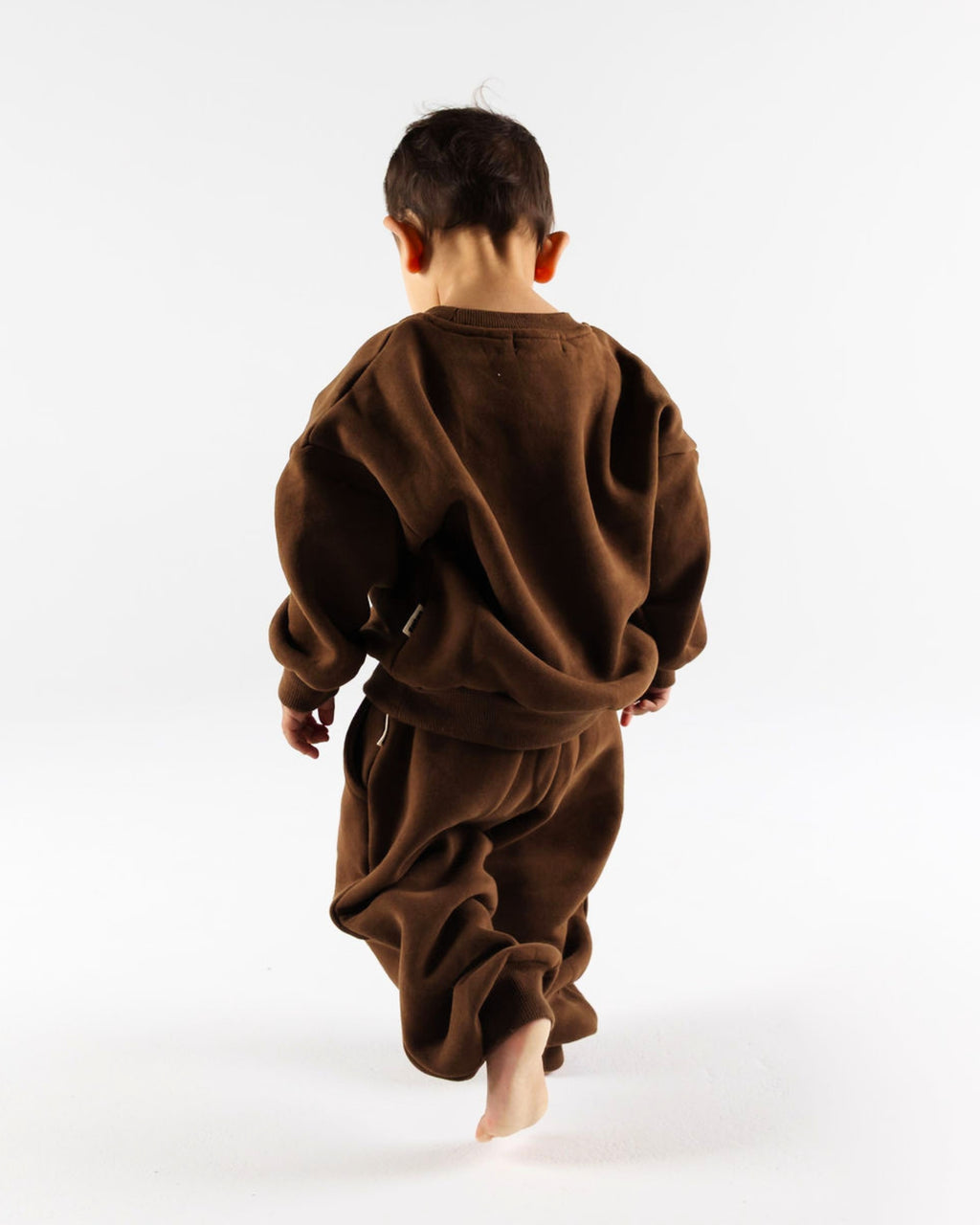 Happy kid in The Downtown Set - Chocolate Espresso