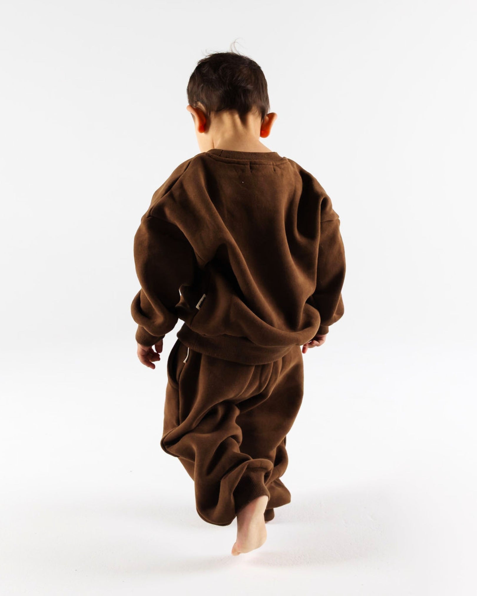 Happy kid in The Downtown Set - Chocolate Espresso