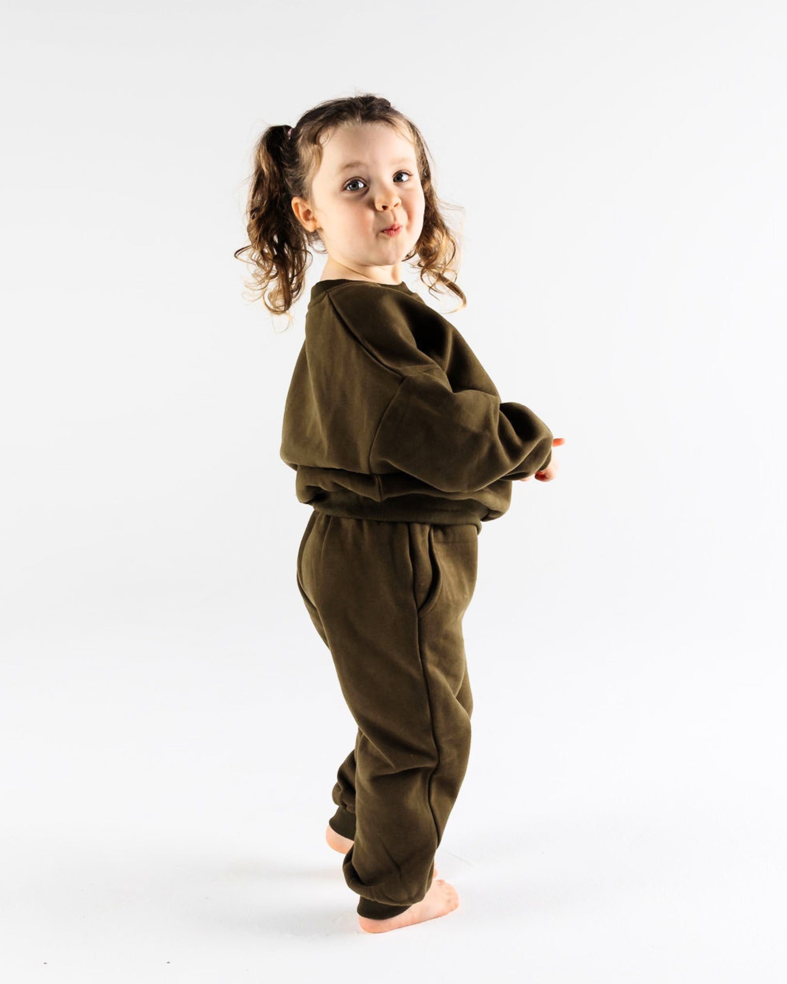 Cool kid wearing Crumb's Downtown Set Pistachio Truffle