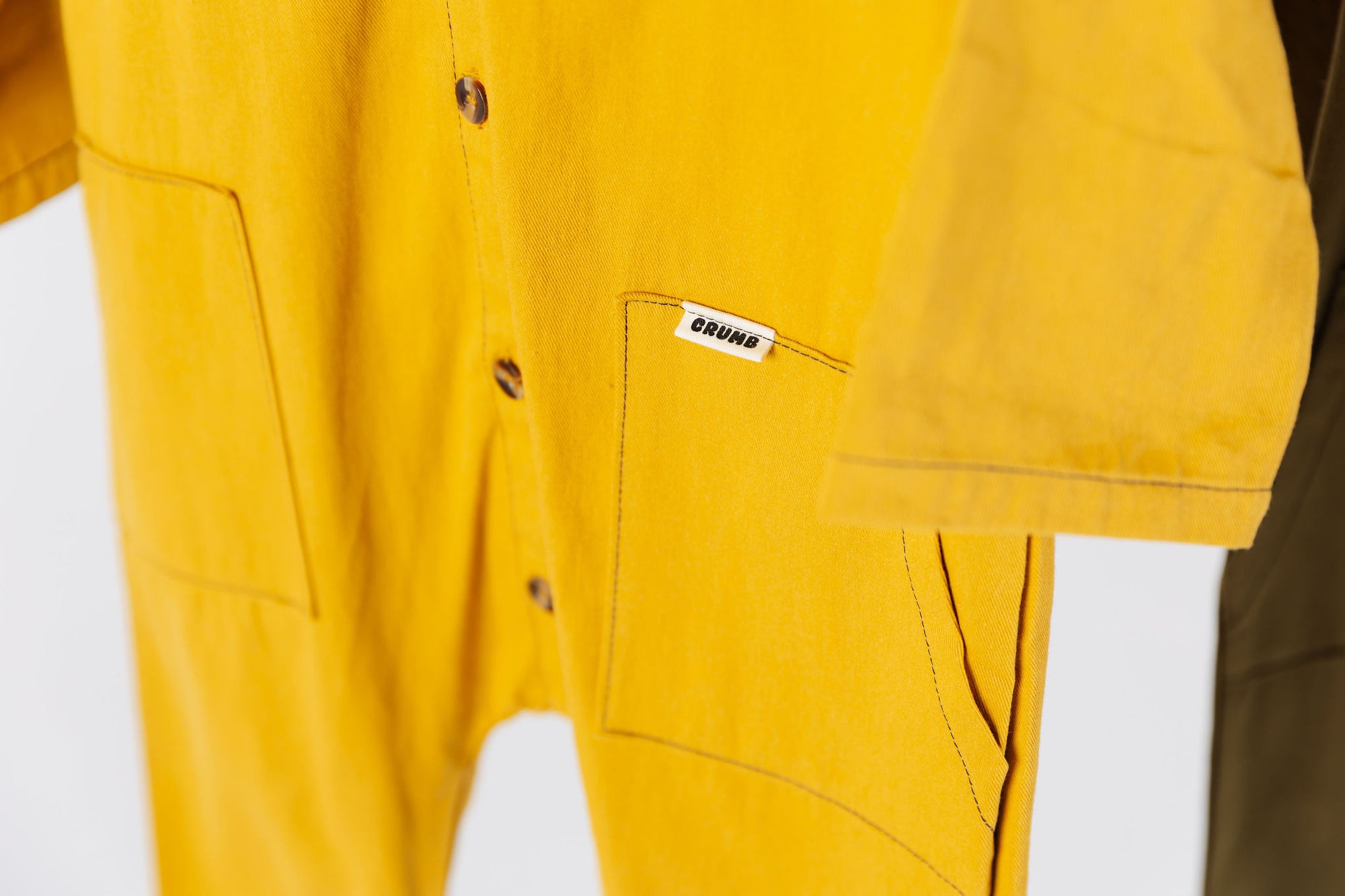 Front pockets of our Honeycomb Off Beat Overalls