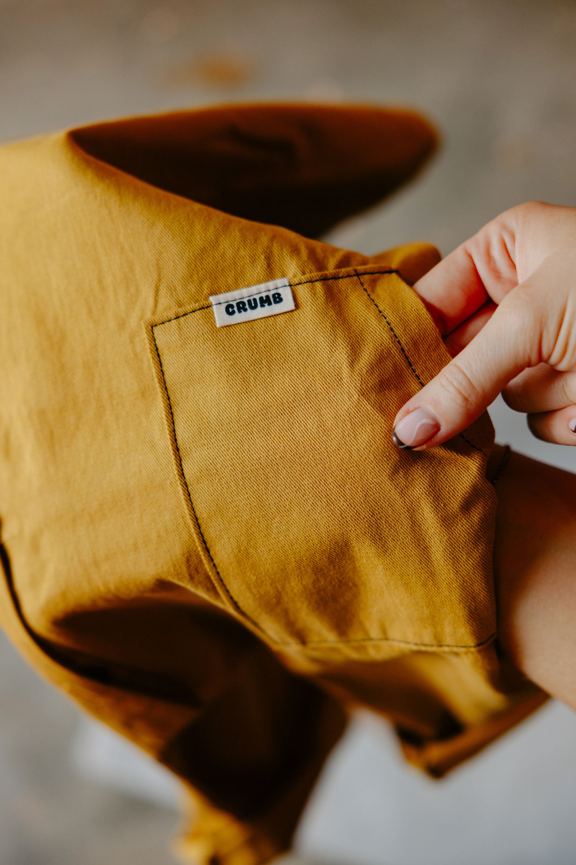 Close-up of front pocket on our Crumb Honeycomb Off Beat Overalls