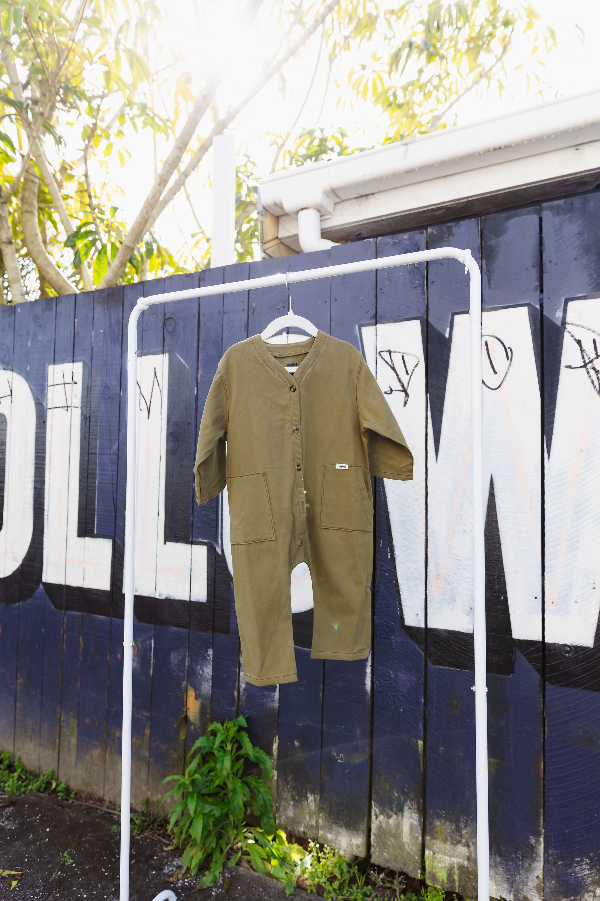 Kids jumpsuit hanging to dry
