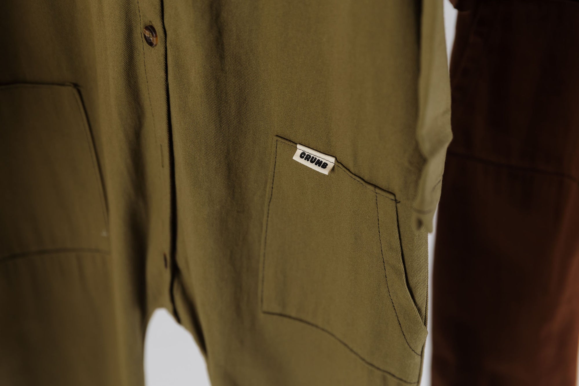 Close-up of front pockets of kids overall by Crumb