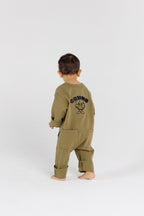 Child wearing Pistachio Overalls by Crumb