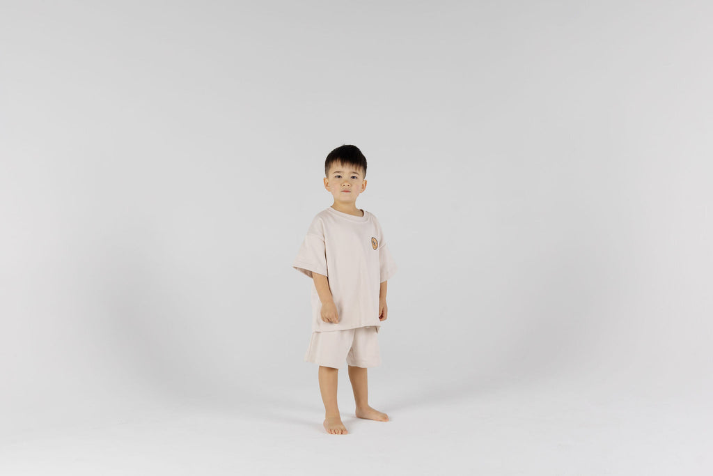 Child wearing The Drop Sleeve Set - Milk