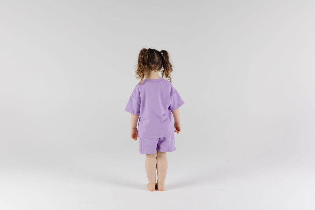 Child wearing Violet Crumble Drop Sleeve Set