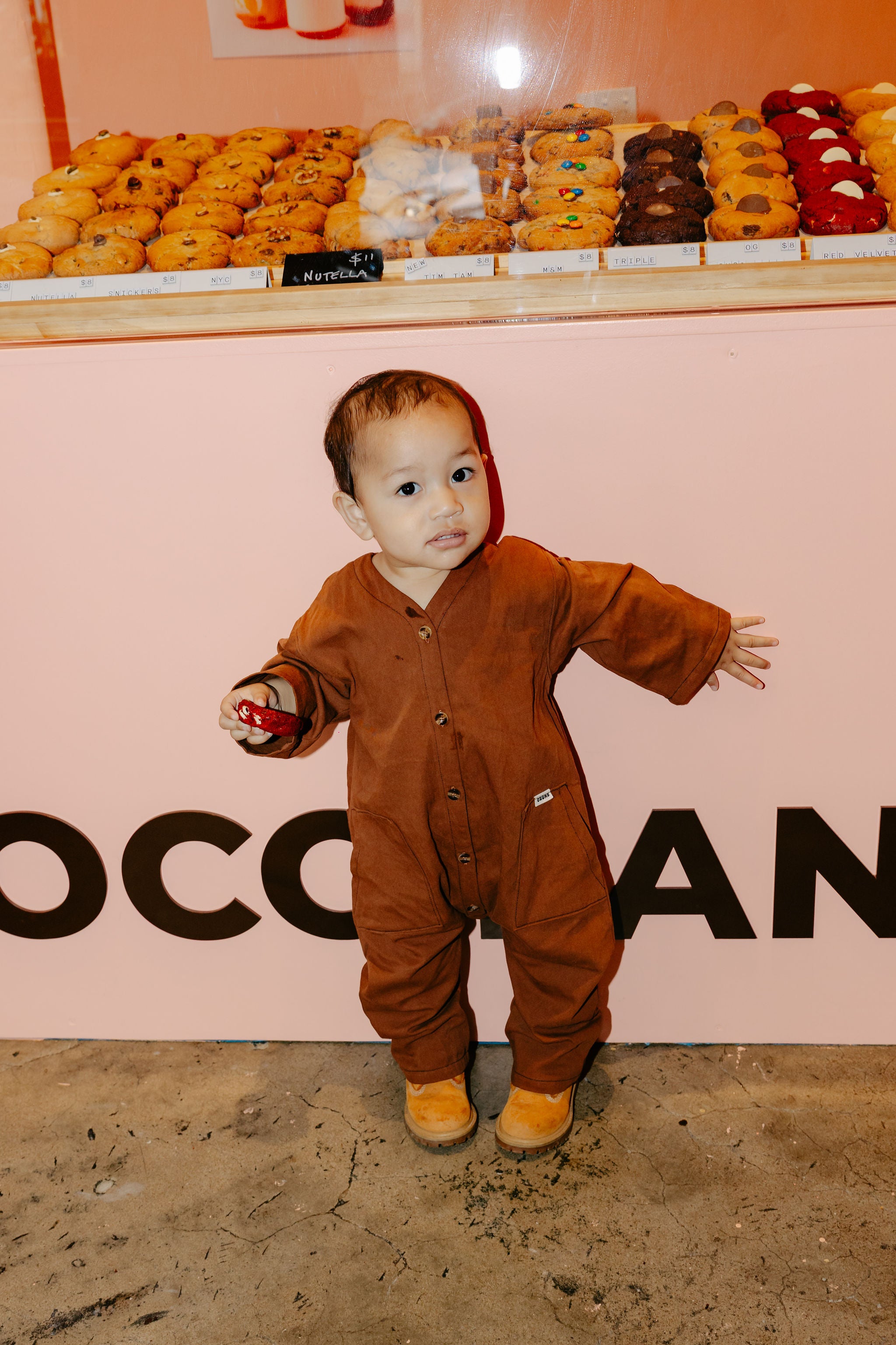 Kid among cookies in his Chocolate Brown Off Beat Overalls