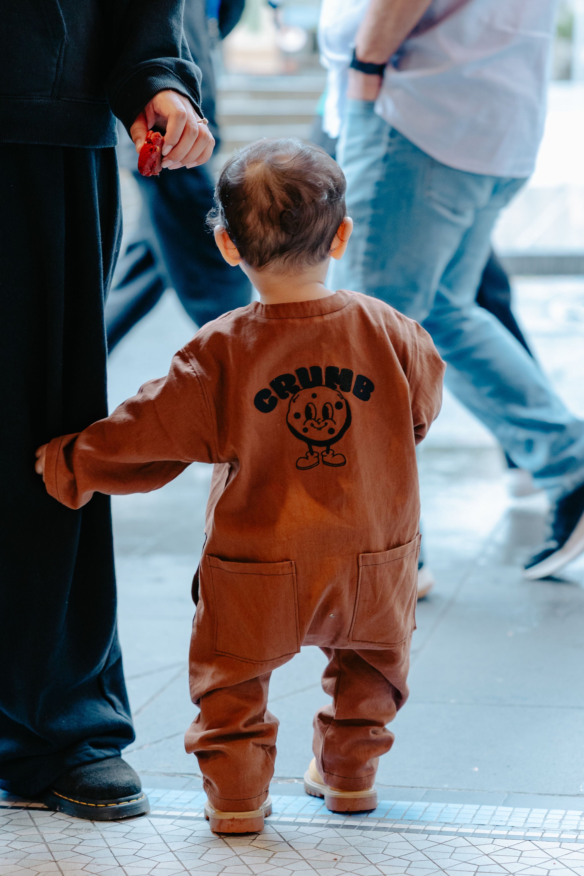 Child in Chocolate Brown Off Beat Overalls walking outdoors