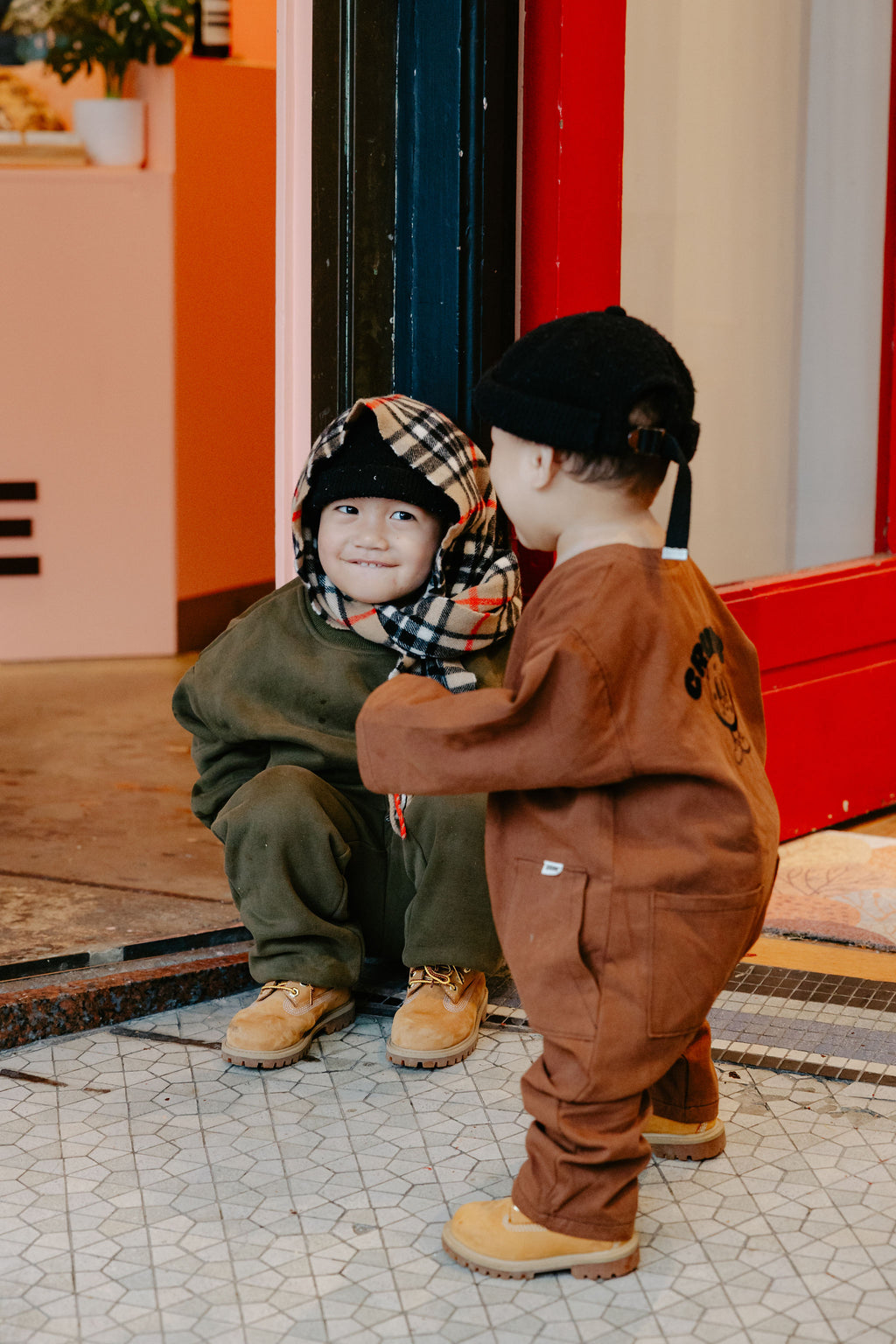 Kids at play with matching outfit