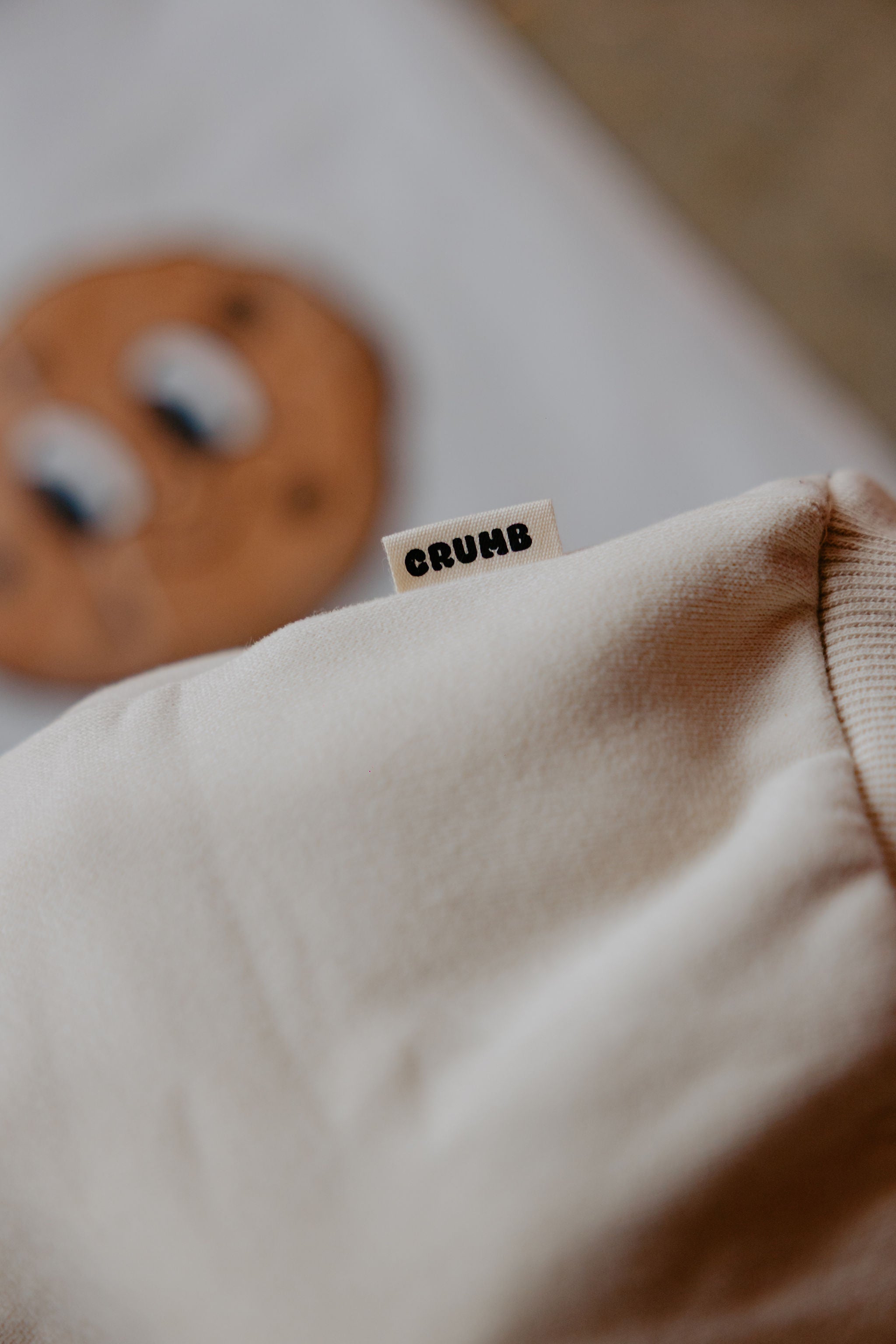 Close-up of Crumb's Downtown Set Milk White kids tracksuit