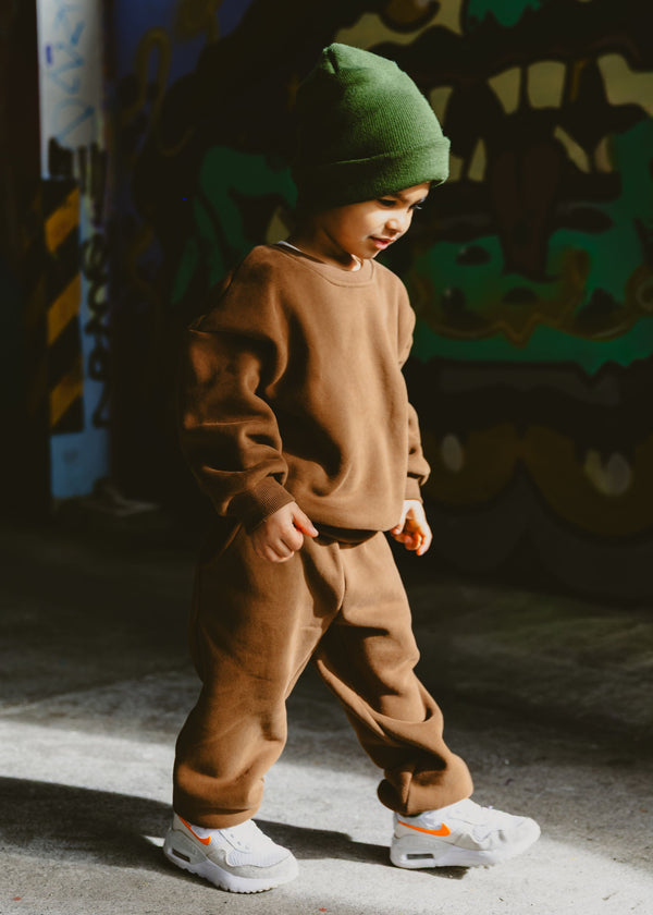 Child in Crumb Clothing premium downtown set. Designed in New Zealand. 